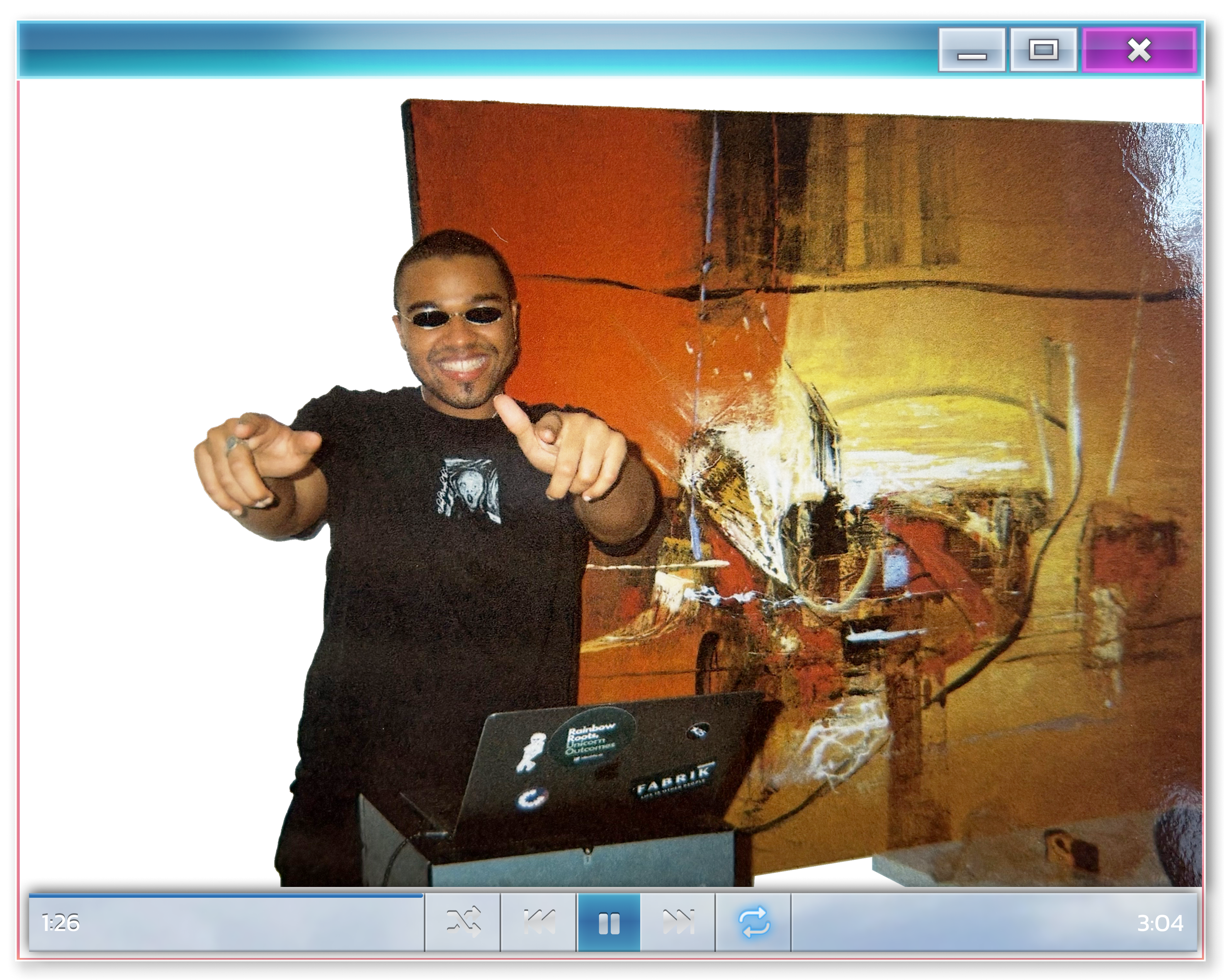 Photo of Josh DJing in an old school computer application window